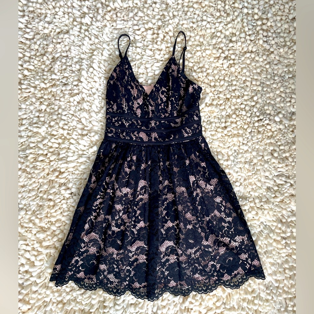 Black and pinkish colored dress. Cozy fit and practically brand new!
